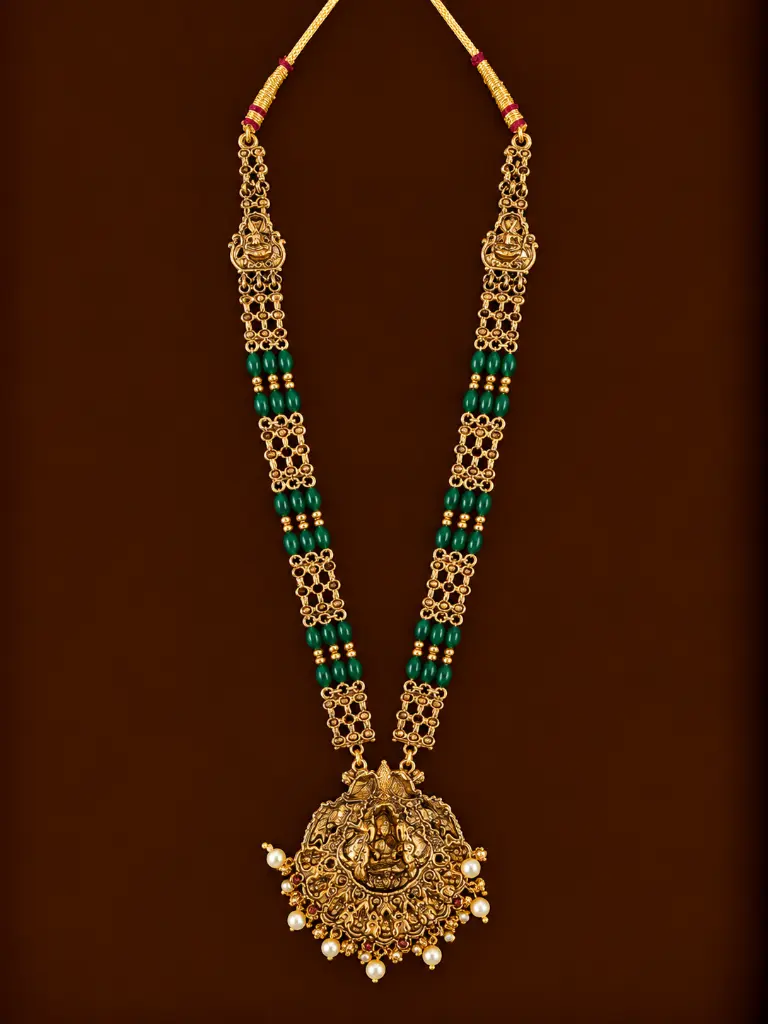 Ornate Gold Temple Necklace with Green Beads.webp