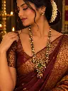Traditional Bridal Portrait with Temple Jewelry.webp
